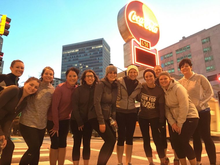 group of city running tourists