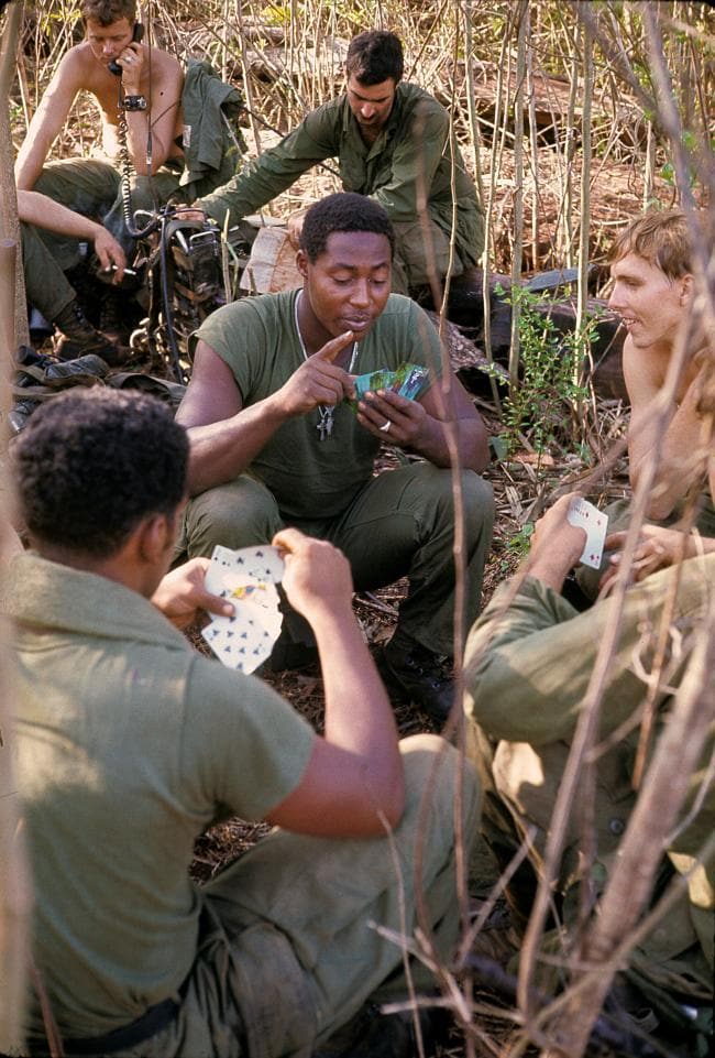 1st Cavalry Troops Relaxing Over a Card Game, South Vietnam, James H. Holcombe Jr., photographer, circa 1970, Gift of James H. Holcombe Jr., 2017
