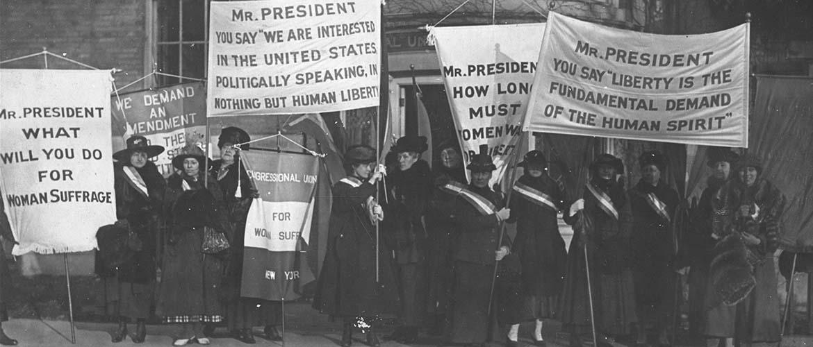 Image of women picketing during the suffrage movement, featured in Any Great Change thanks to the Library of Congress.