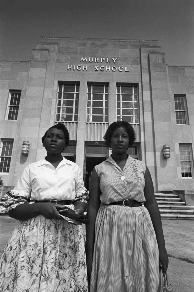 Two young women in front of Murphy High School
