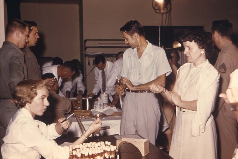 people lined up to get the vaccine for influenza virus