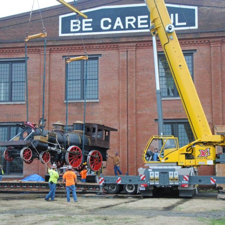 texas locomotive being lifted