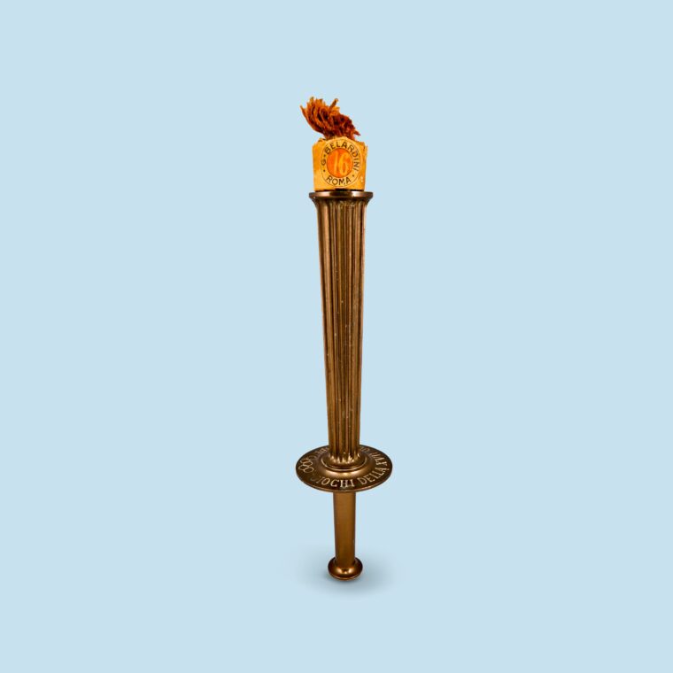 Bronze and orange torch with red flame on blue background
