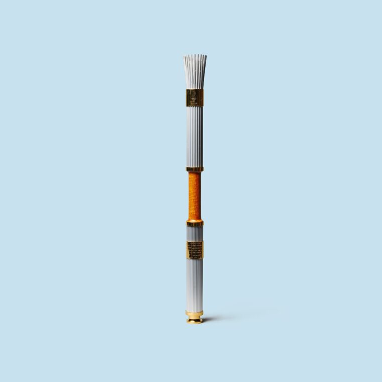 White, orange, and gold accented torch on blue background