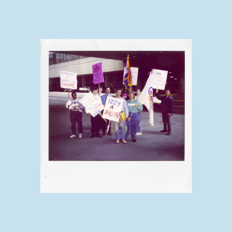 Polaroid of people holding protest signs