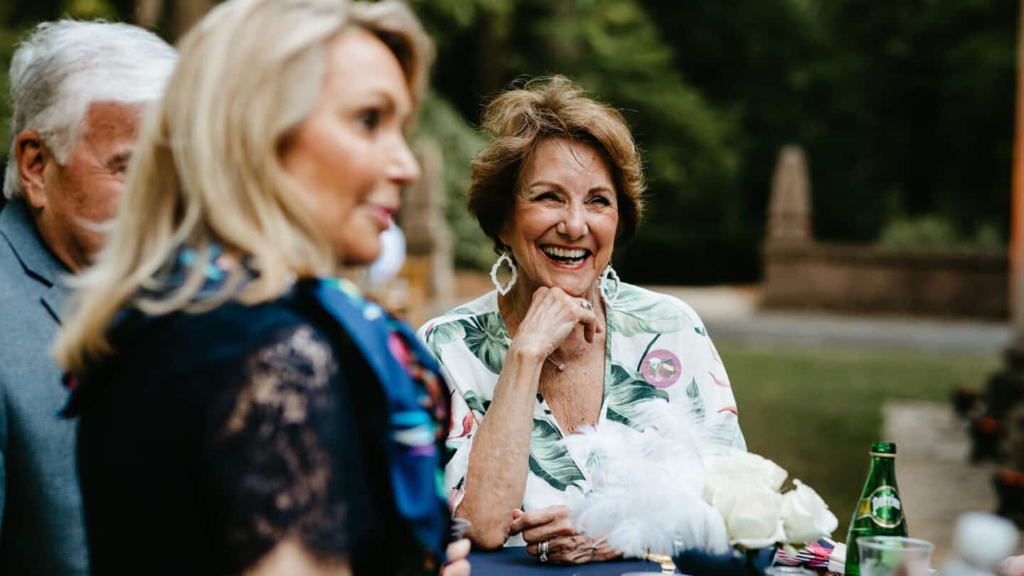 Woman laughing at History After Hours event