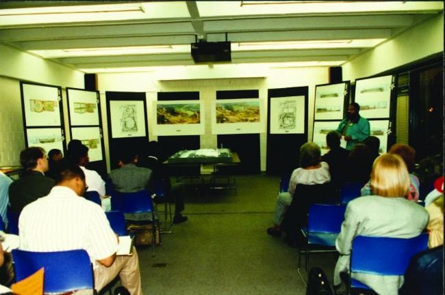 Meeting of Atlanta Committee for the Olympic Games, Stadium Neighborhood Outreach Columbus Ward addressing the room, Atlanta, circa 1993