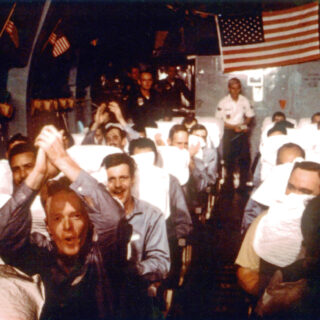 Newly Freed POWs on the Flight Home from Vietnam