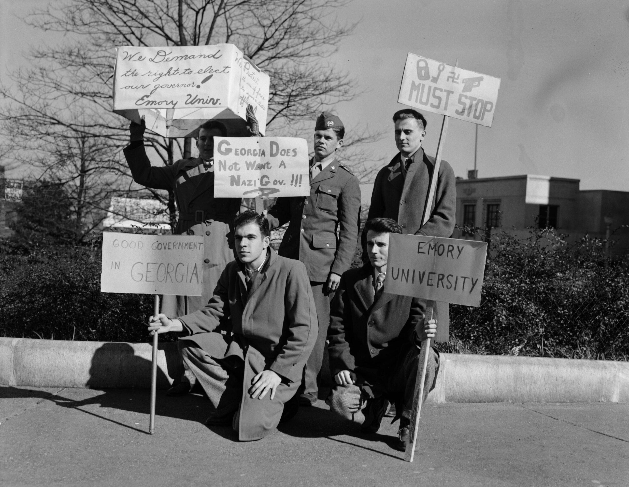 The Three Governors Controversy, boys holding protest posters