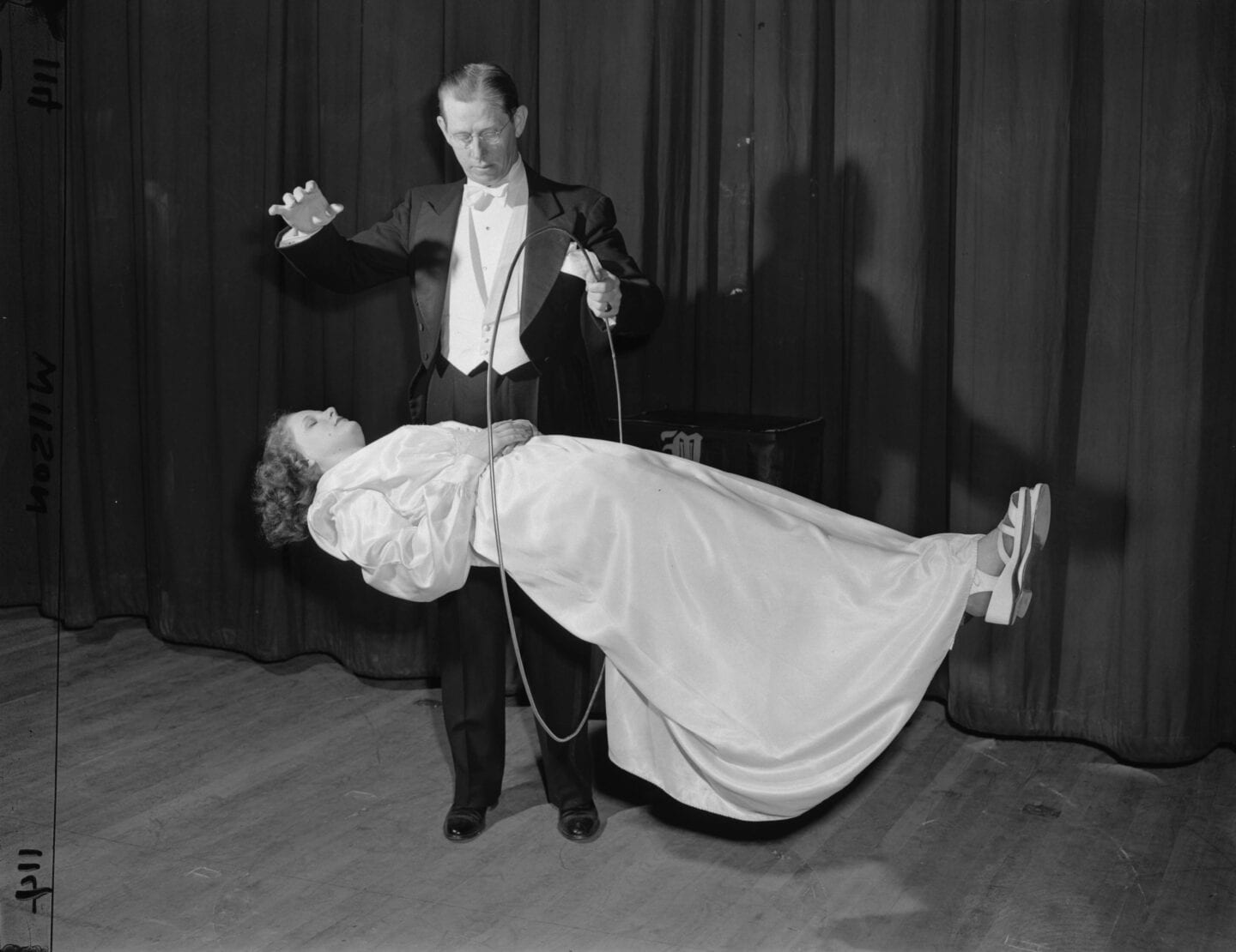 Magician Martin Hal levitating a woman Atlanta History Center