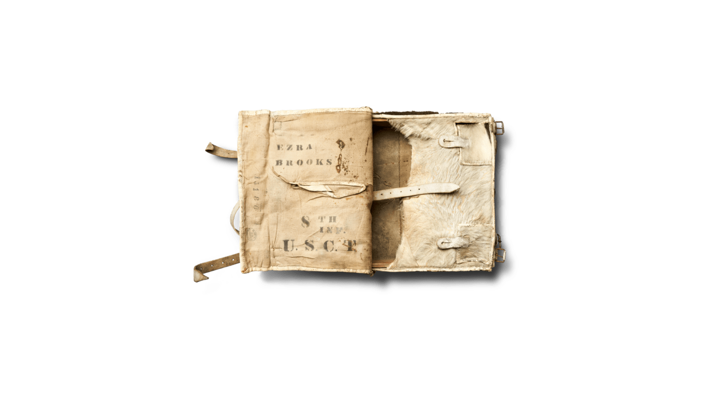 Tan Cowhide Civil War Era Knapsack on plain background