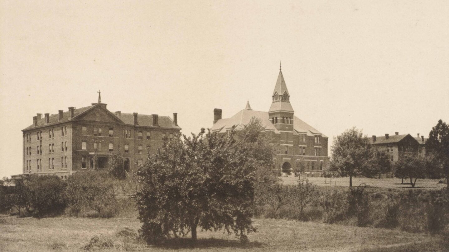 View of the main campus of Atlanta University, including Stone Hall, designed by Gottfried L. Norrman. Atlanta History Photograph Collection
