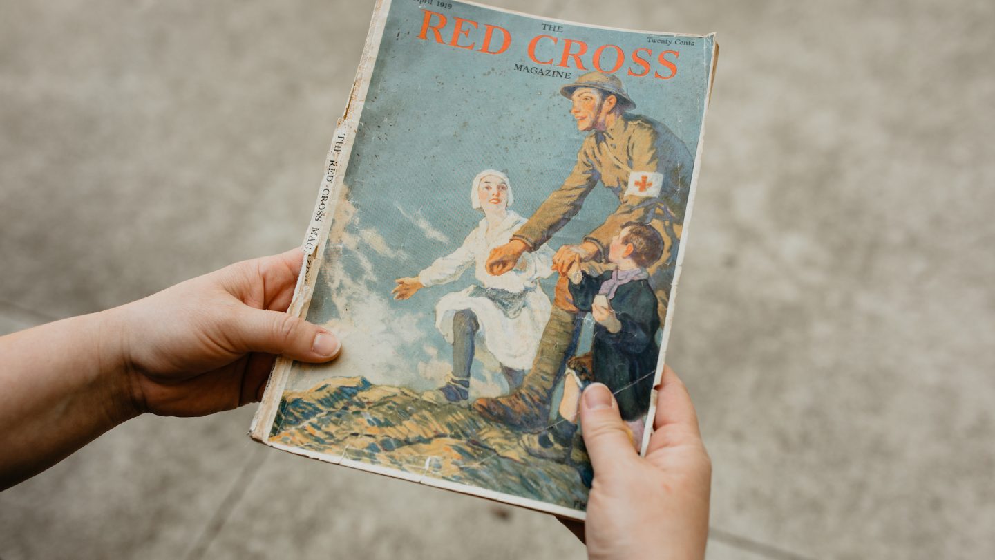 hands holding The red cross Magazine