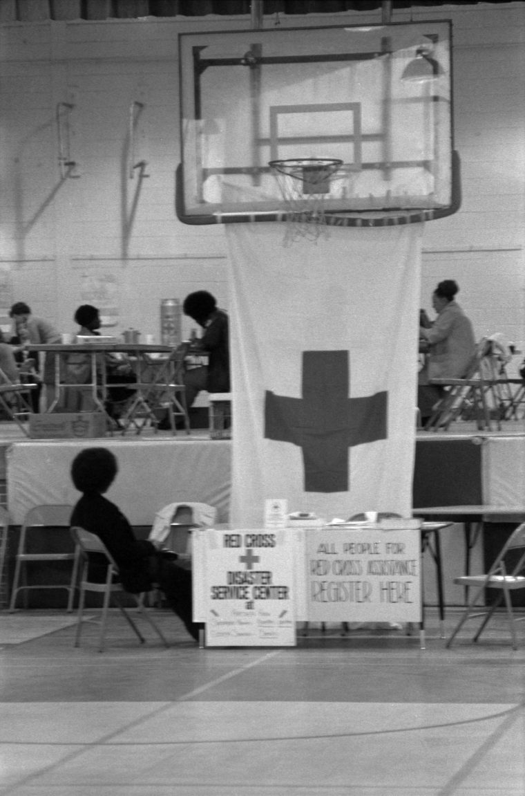 View of a Red Cross Disaster Service Center temporarily set up in the gymnasium of the Perry Homes housing project