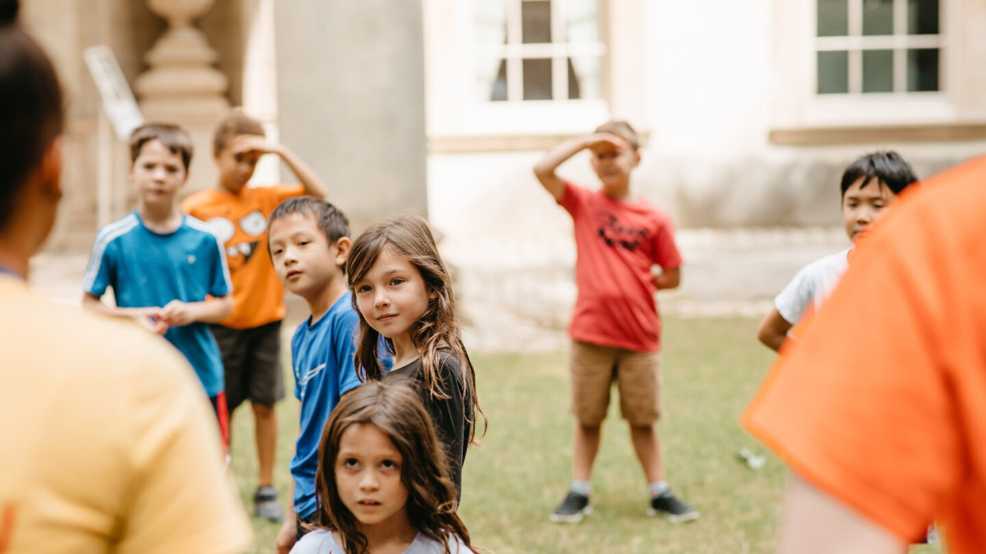 Summer camp kids playing outside