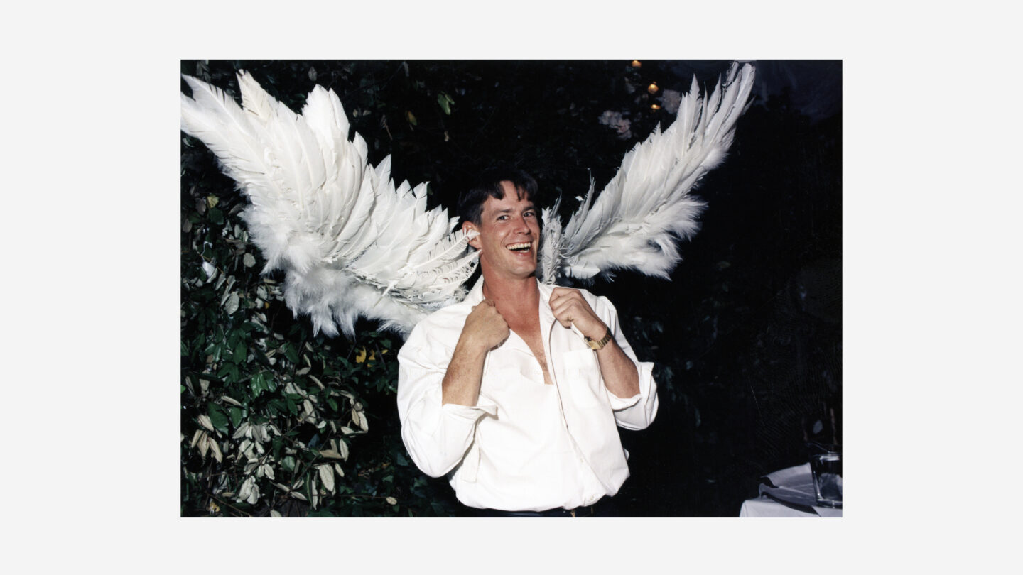 Man with wings at Swan House Ball