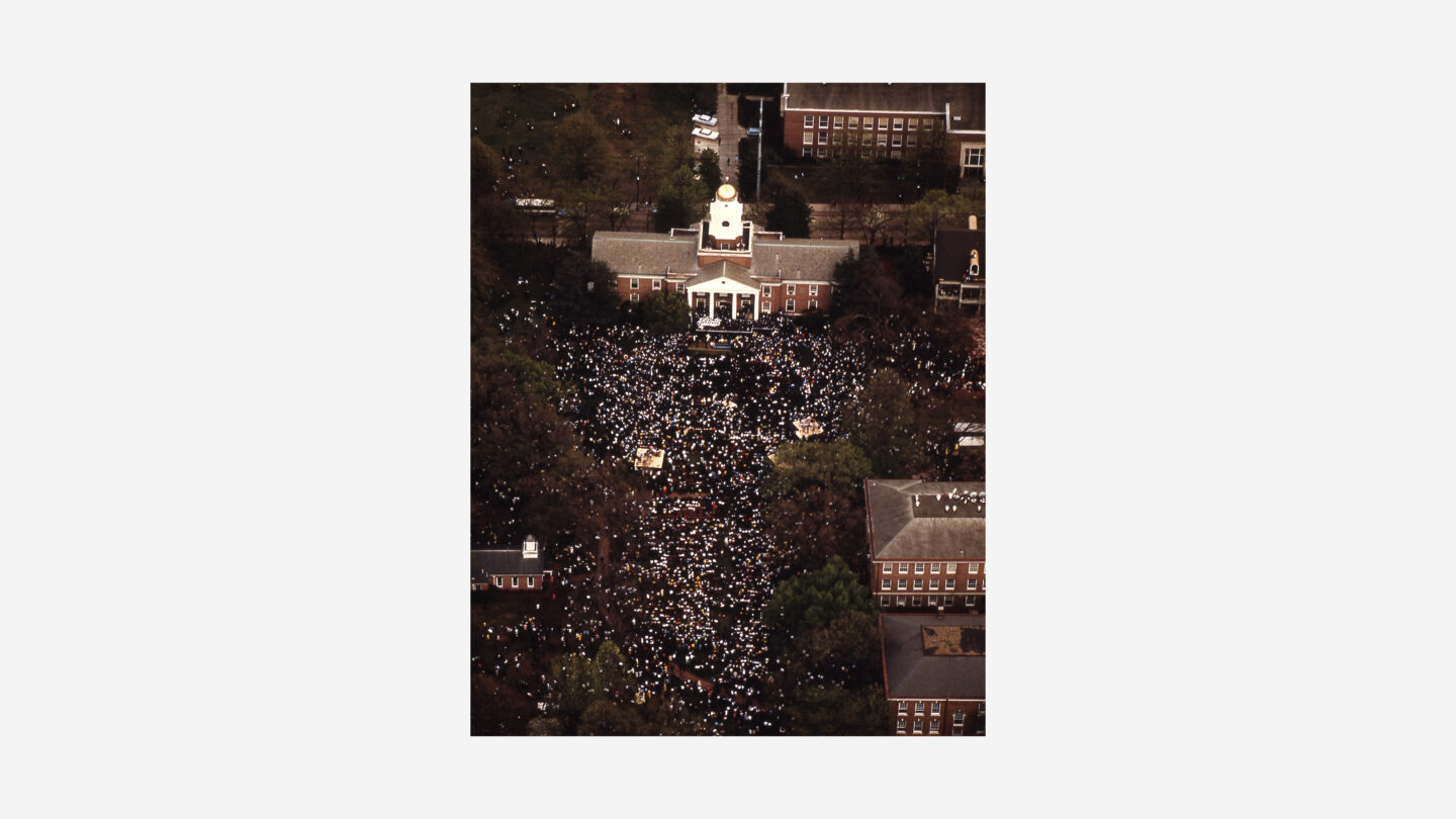 Aerial view of a memorial service in front of Harkness Hall on the campus of Atlanta University during the funeral for Dr. Martin Luther King, Jr.