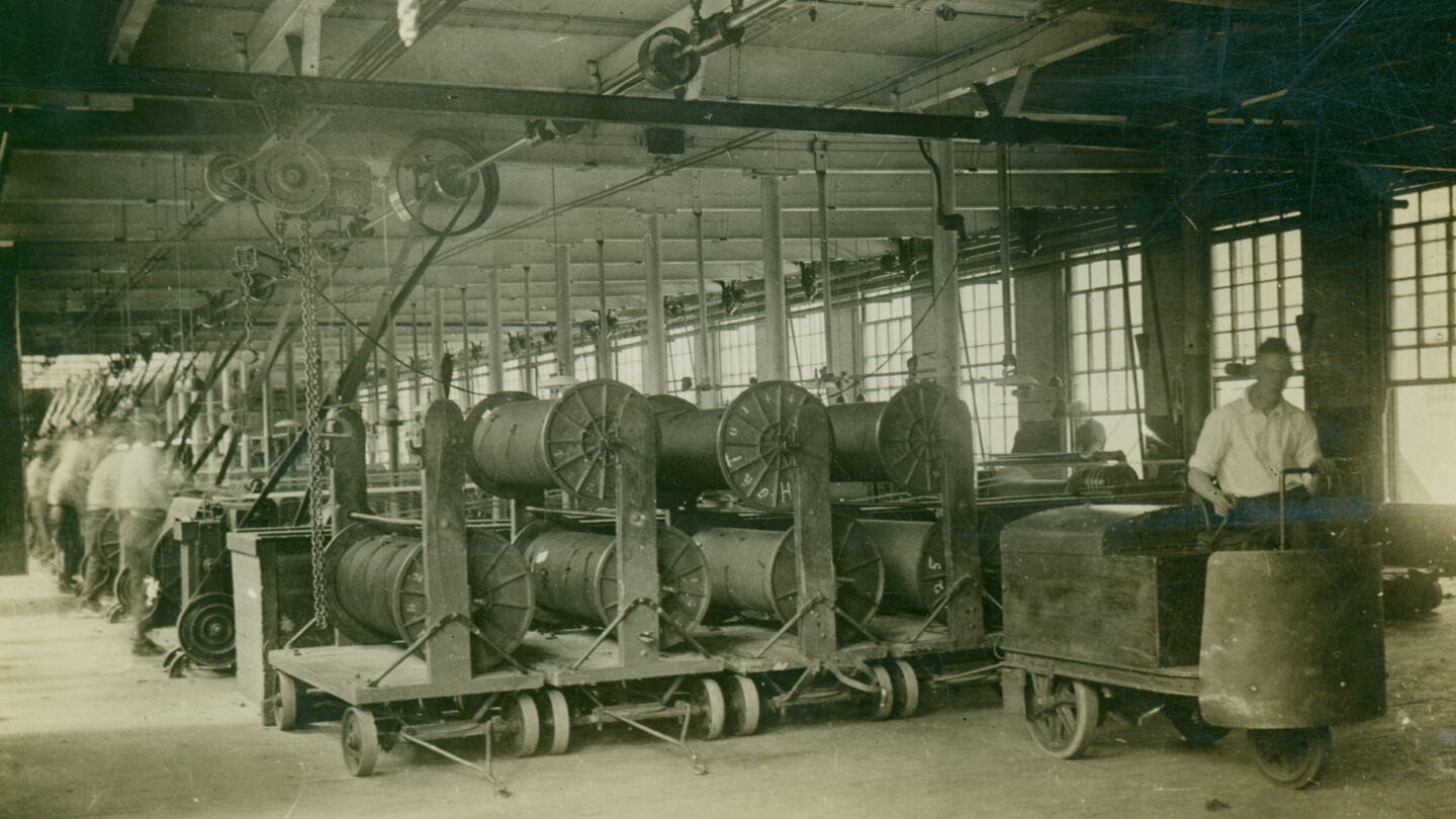 Men work inside the Fulton Bag and Cotton Mills circa 1910 –1930