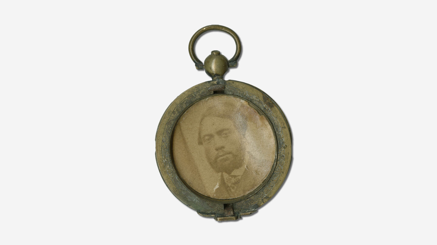 A locket with a photo of William Craft