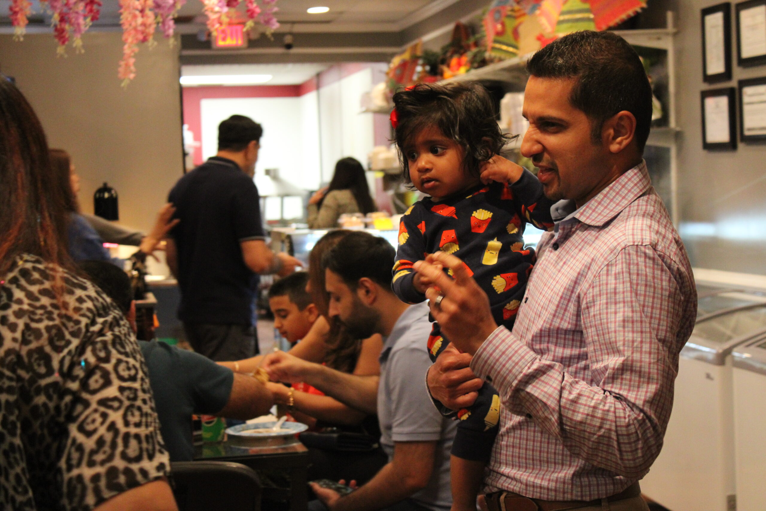 Asim Fareedudin dances with his daughter Layla at Dil Bahar Cafe