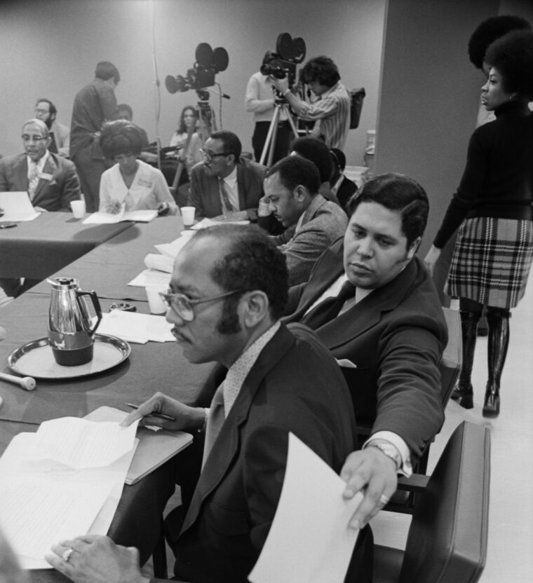 Georgia State Senator Leroy Johnson, foreground, and Atlanta Vice Mayor Maynard Jackson, seated next to Johnson