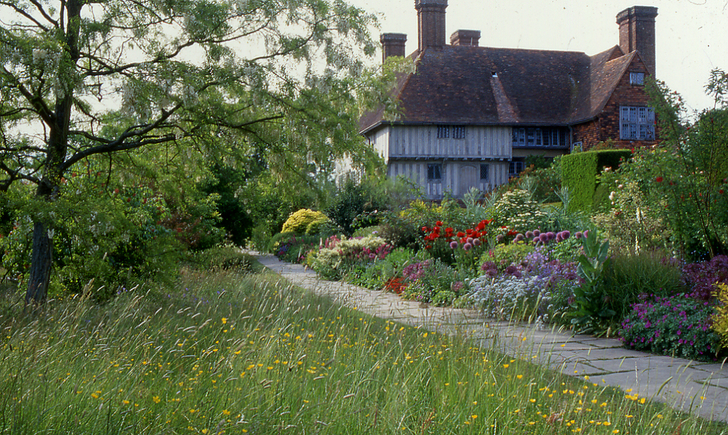 Photo of house in garden
