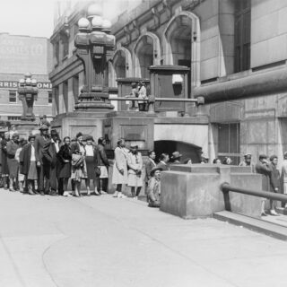 African Americans stand in front of the Fulton County Courthouse in Atlanta to register to vote, 1946