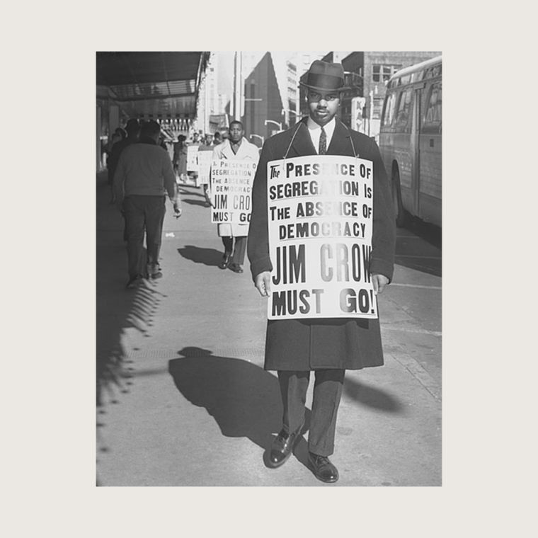 man holding sing in protest