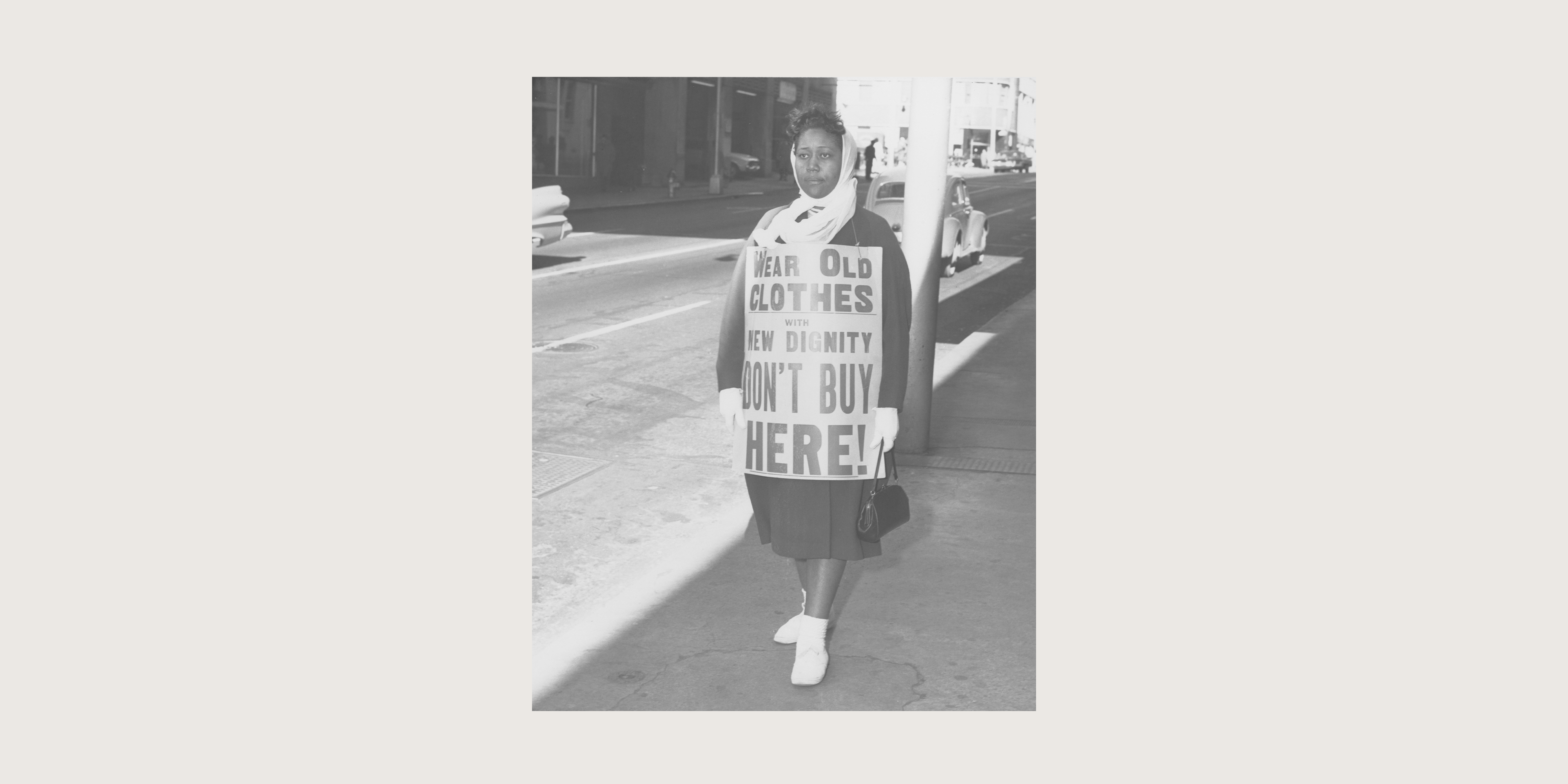 woamn holding sign for protest