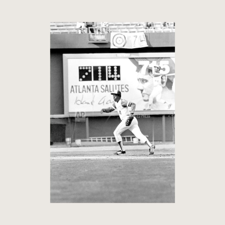 hank aaron in a baseball field